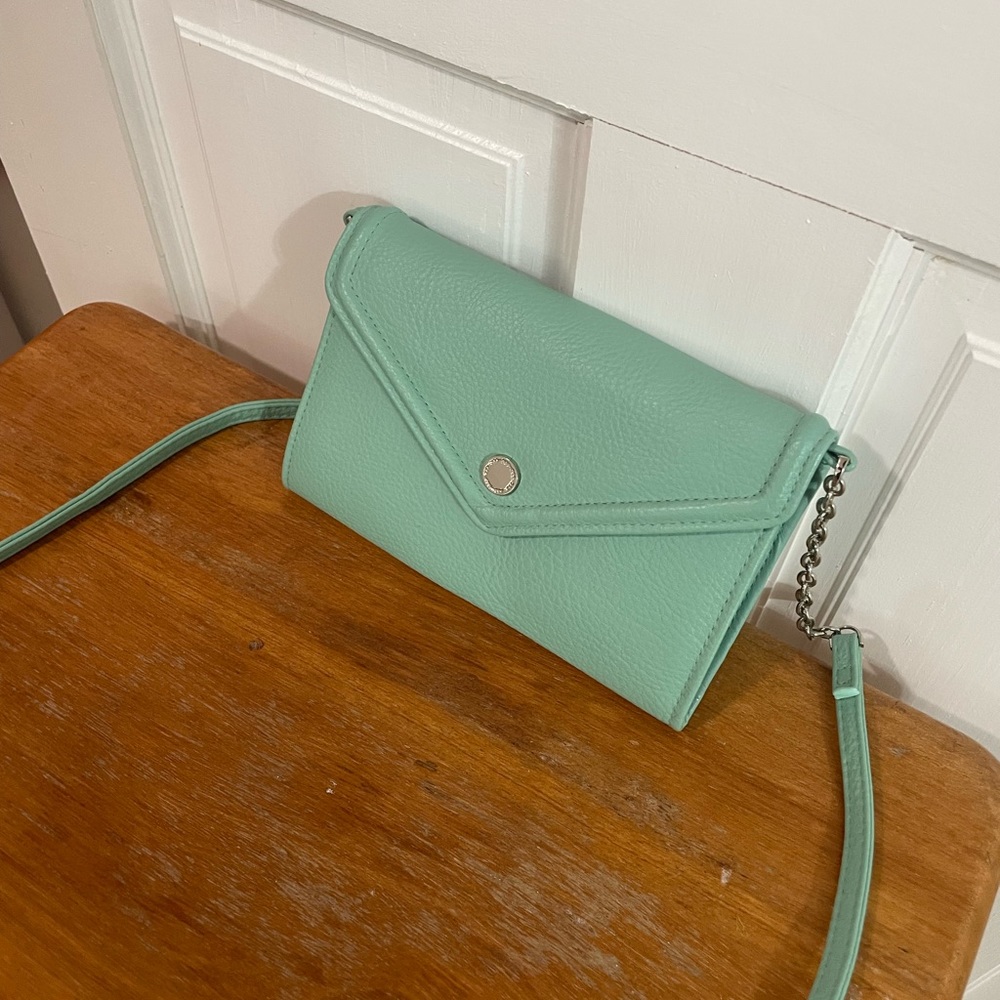 Mint colored crossbody bag.
